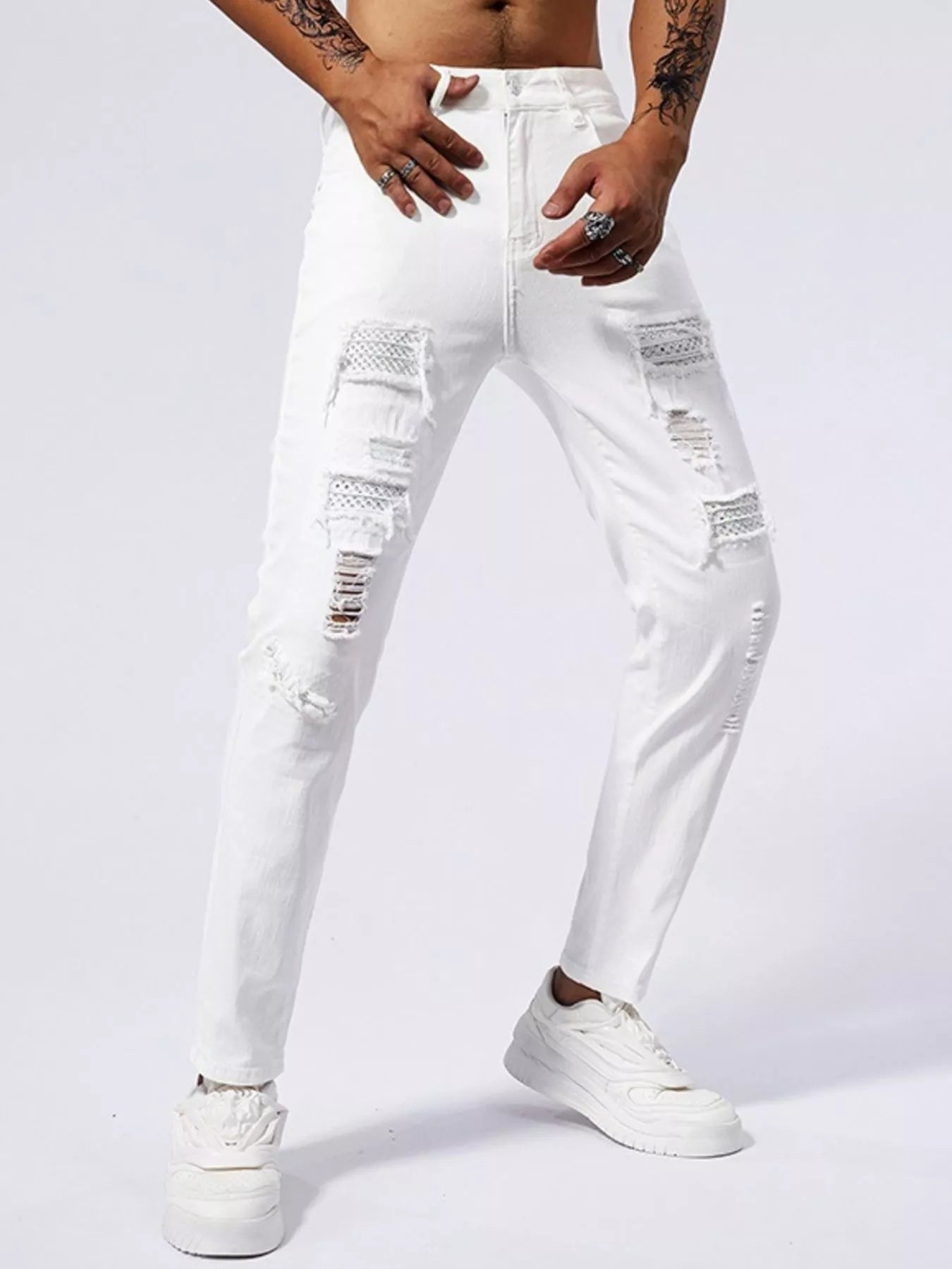 Men's Distressed Slim Fit Jeans designed for comfort and style at Lookzlike