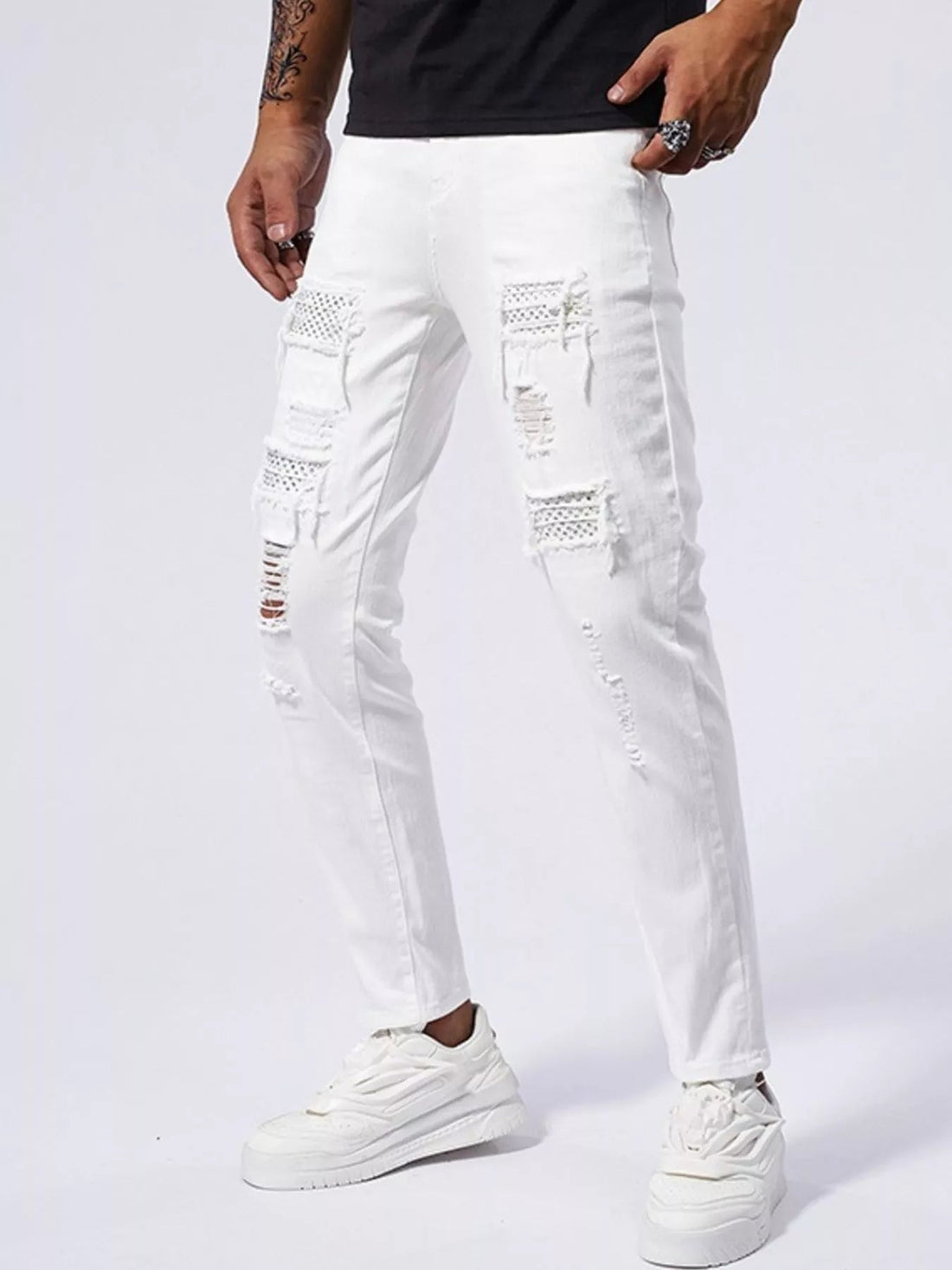 Men's Distressed Slim Fit Jeans designed for comfort and style at Lookzlike