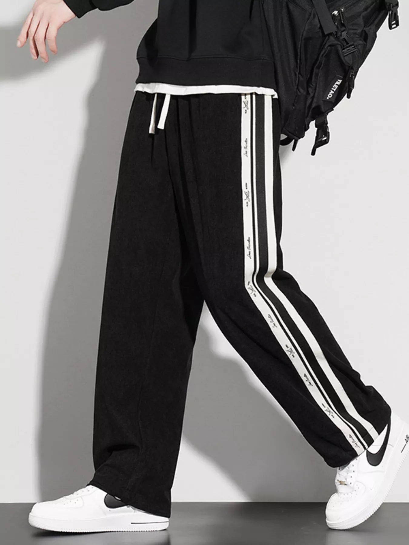 Men's Full Size Striped Side Loose Fit Casual Pants Plus Size designed for comfort and style at Lookzlike