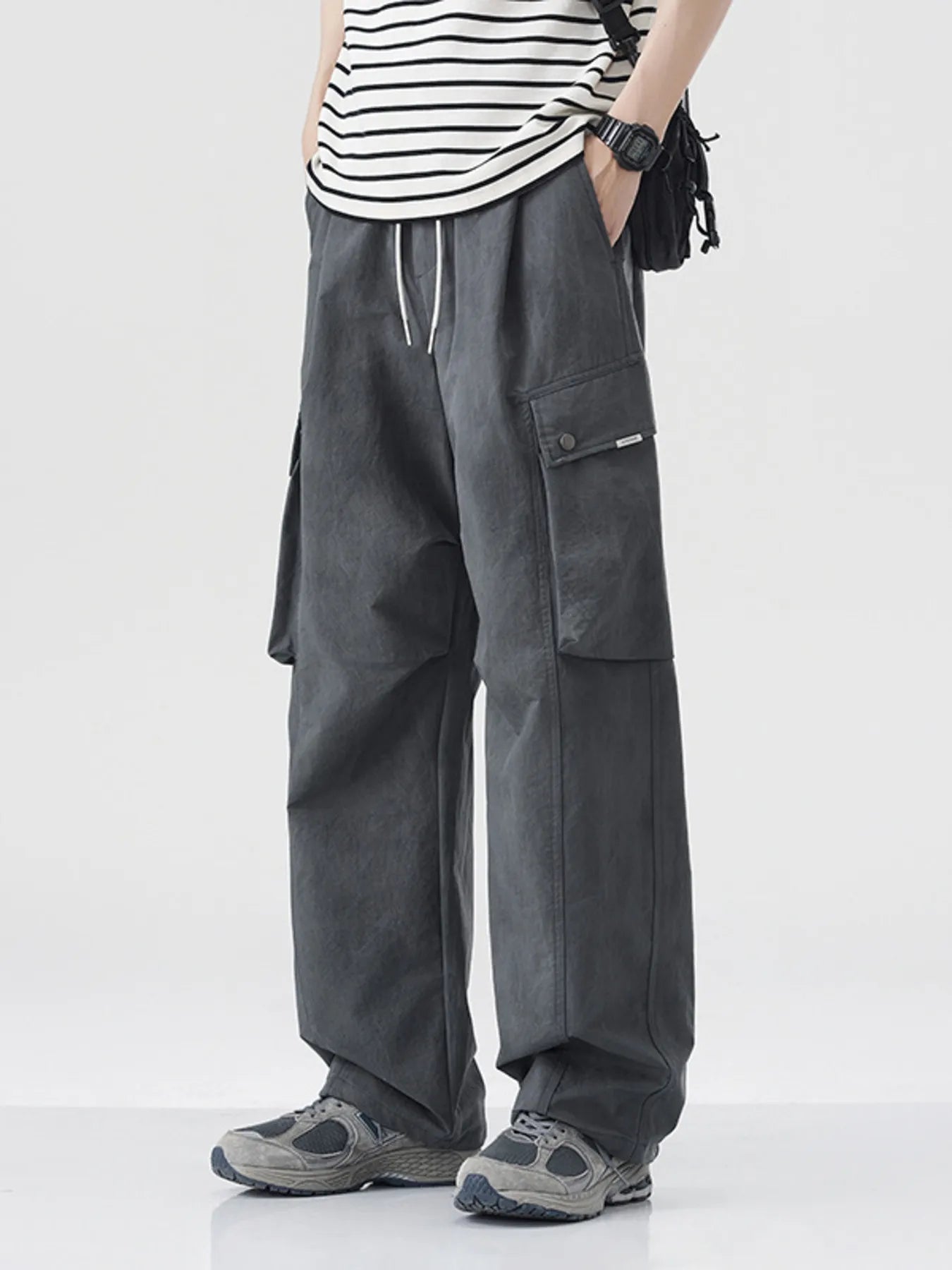 Men's Loose Fit Cargo Pants with Drawstring designed for comfort and style at Lookzlike