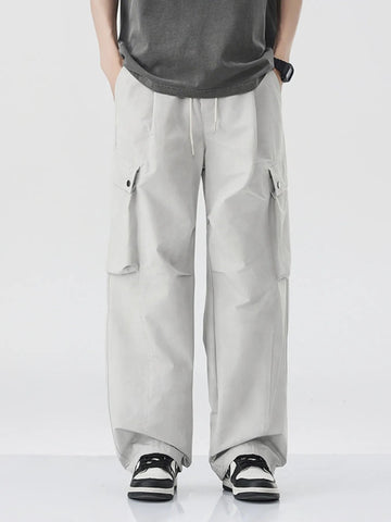 Men's Loose Fit Cargo Pants with Drawstring designed for comfort and style at Lookzlike