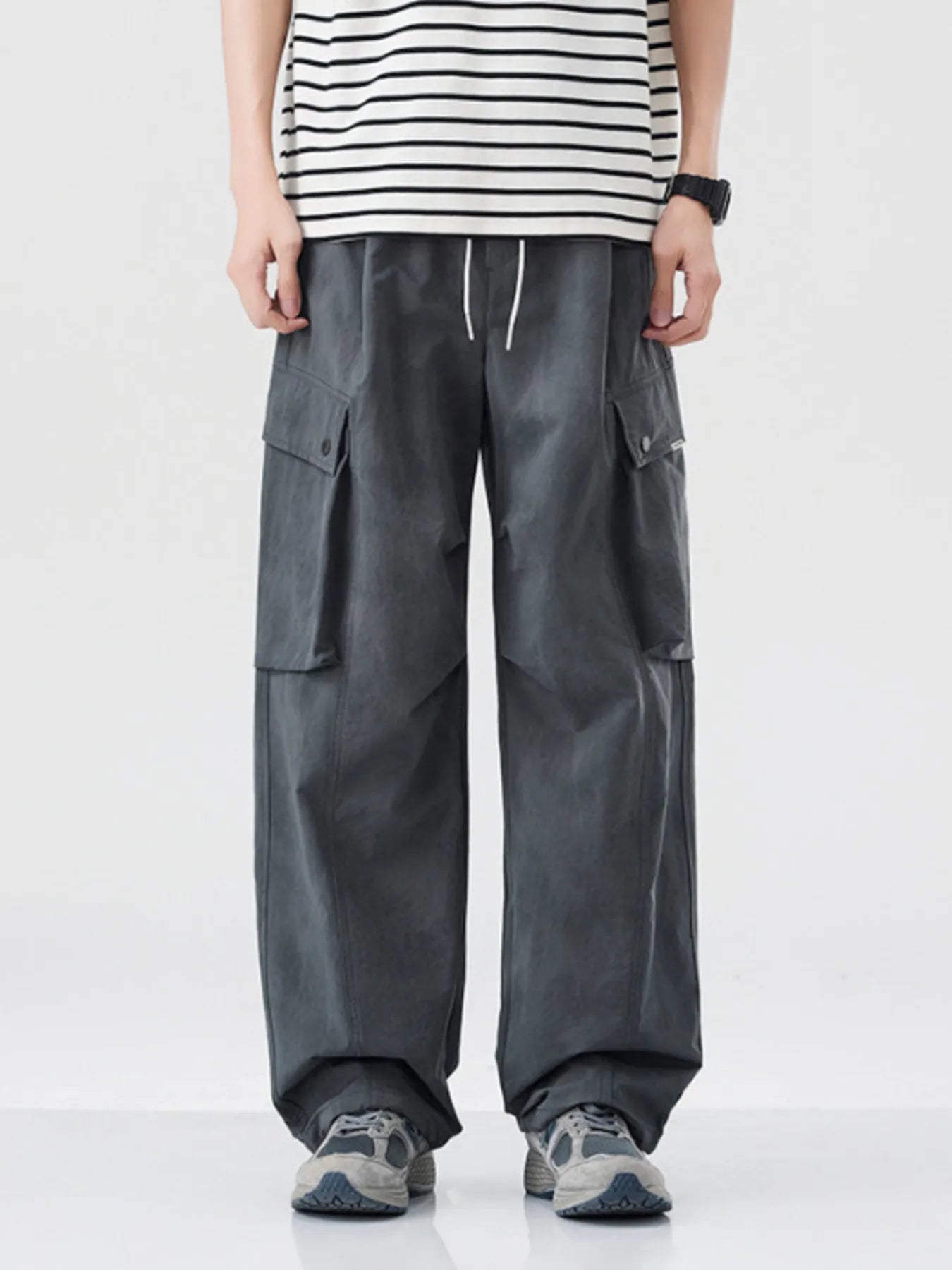Men's Loose Fit Cargo Pants with Drawstring designed for comfort and style at Lookzlike