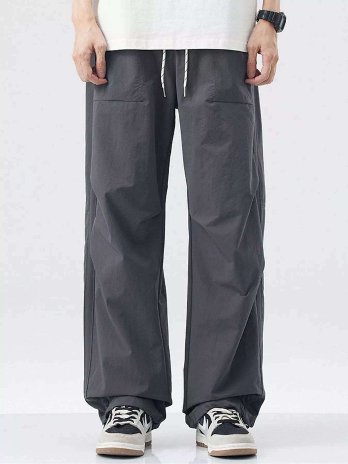 Men's Loose - Fit Drawstring Wide Leg Pants designed for comfort and style at Lookzlike