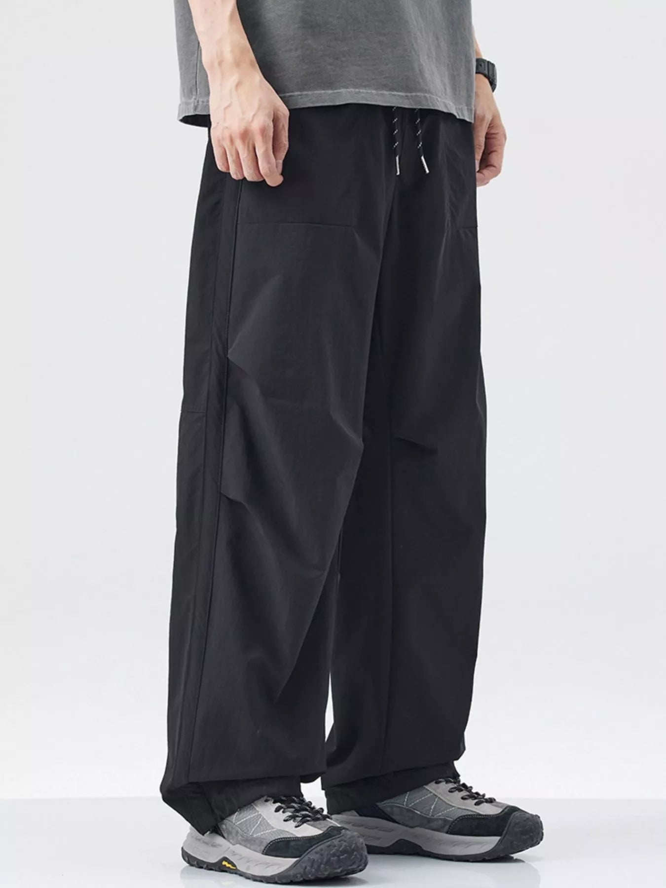 Men's Loose - Fit Drawstring Wide Leg Pants designed for comfort and style at Lookzlike