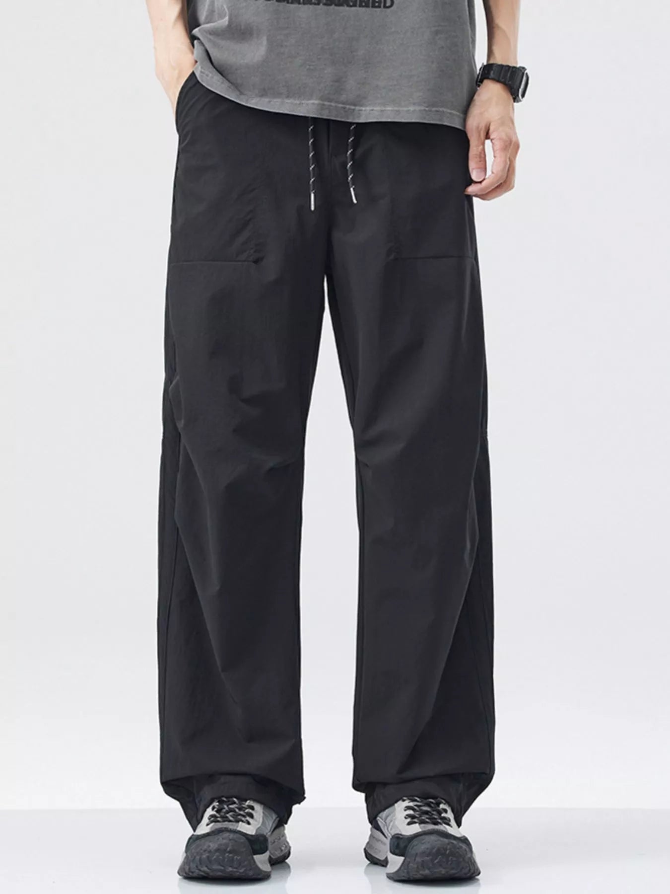 Men's Loose - Fit Drawstring Wide Leg Pants designed for comfort and style at Lookzlike