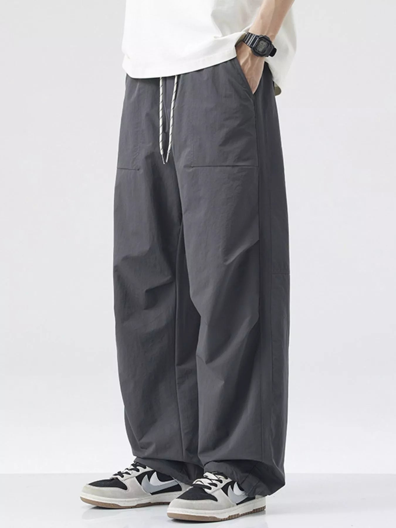 Men's Loose - Fit Drawstring Wide Leg Pants designed for comfort and style at Lookzlike