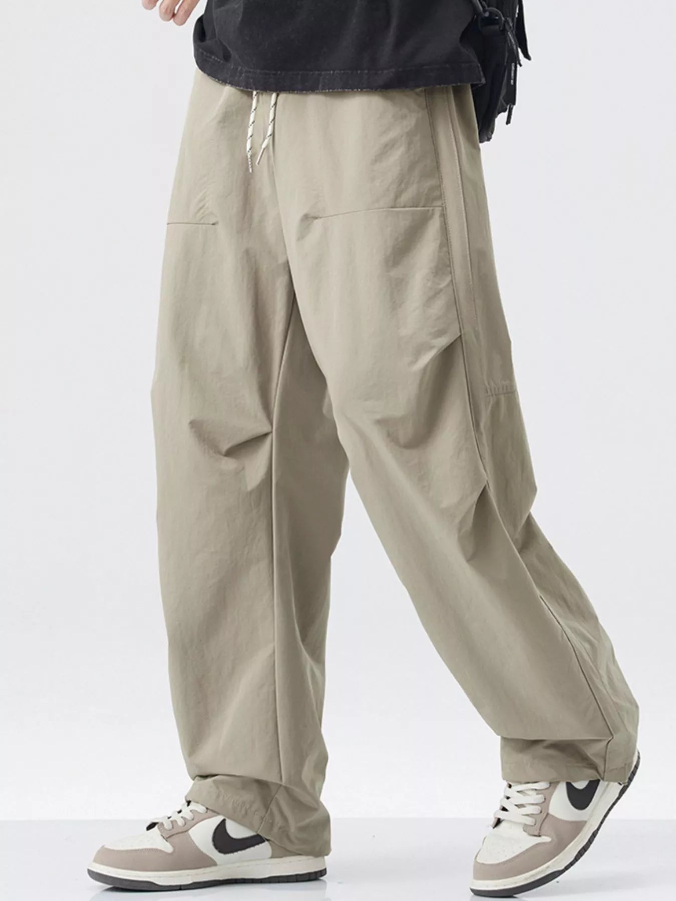 Men's Loose - Fit Drawstring Wide Leg Pants designed for comfort and style at Lookzlike