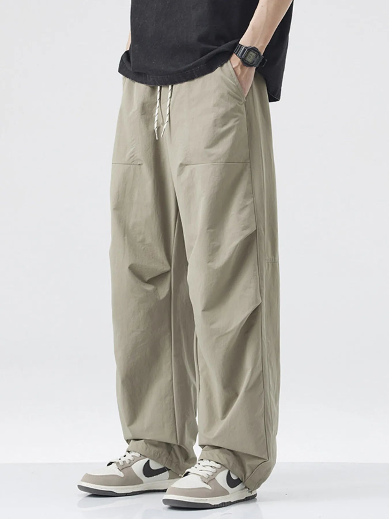 Men's Loose - Fit Drawstring Wide Leg Pants designed for comfort and style at Lookzlike