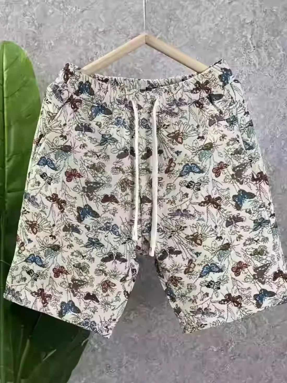 Men's Plus Size Drawstring Printed Shorts designed for comfort and style at Lookzlike