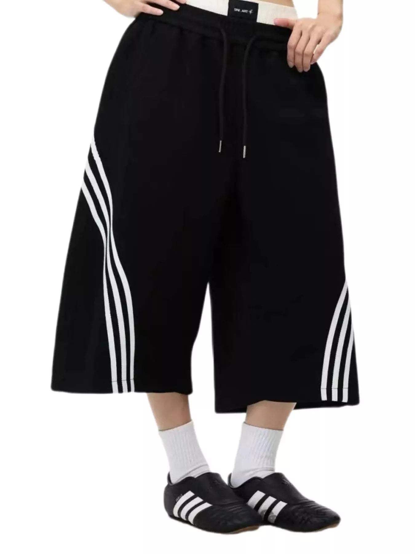 Men's Striped Wide-Leg Cropped Pants designed for comfort and style at Lookzlike
