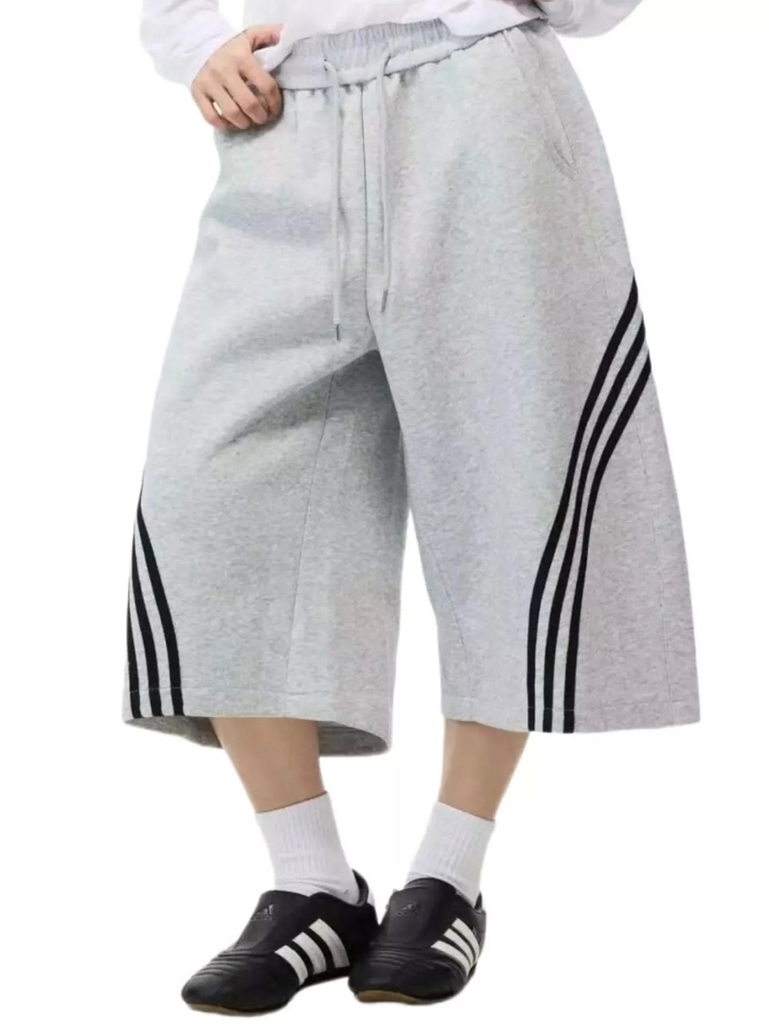 Men's Striped Wide-Leg Cropped Pants designed for comfort and style at Lookzlike
