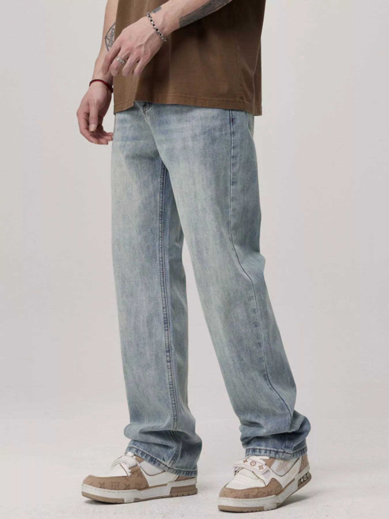 Men's Wash Loose Fit Jeans designed for comfort and style at Lookzlike
