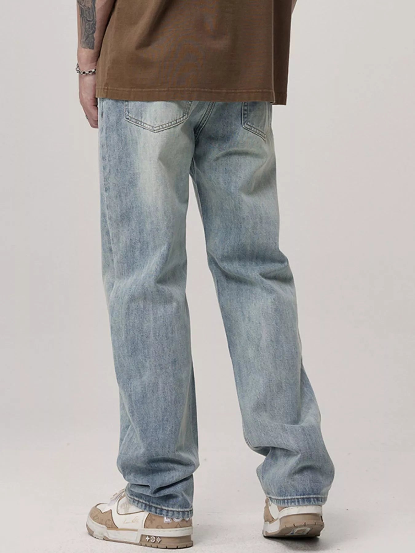 Men's Wash Loose Fit Jeans designed for comfort and style at Lookzlike