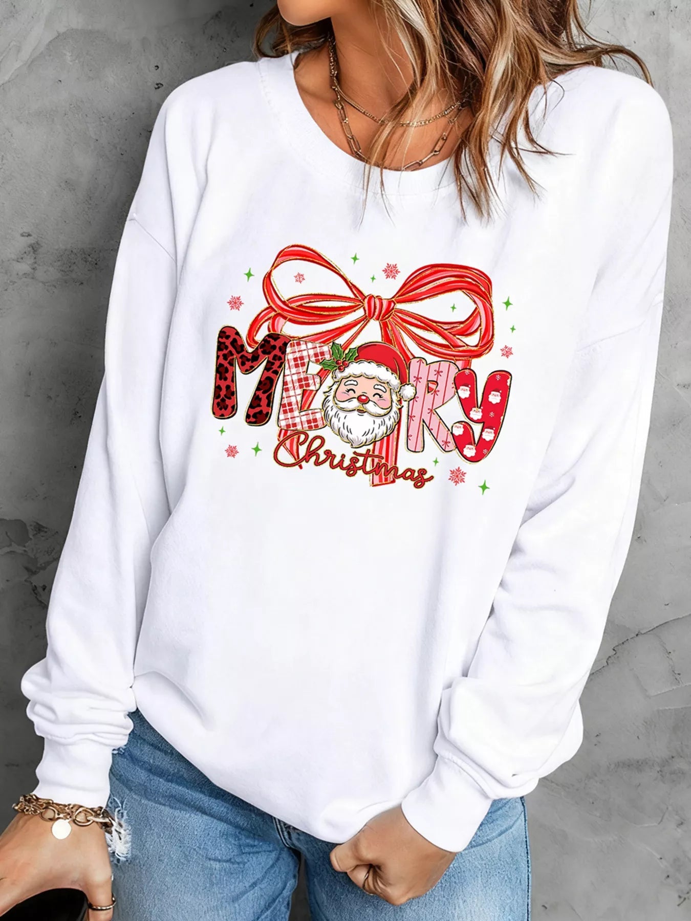 Merry Christmas Graphic Long Sleeve Sweatshirt designed for comfort and style at Lookzlike