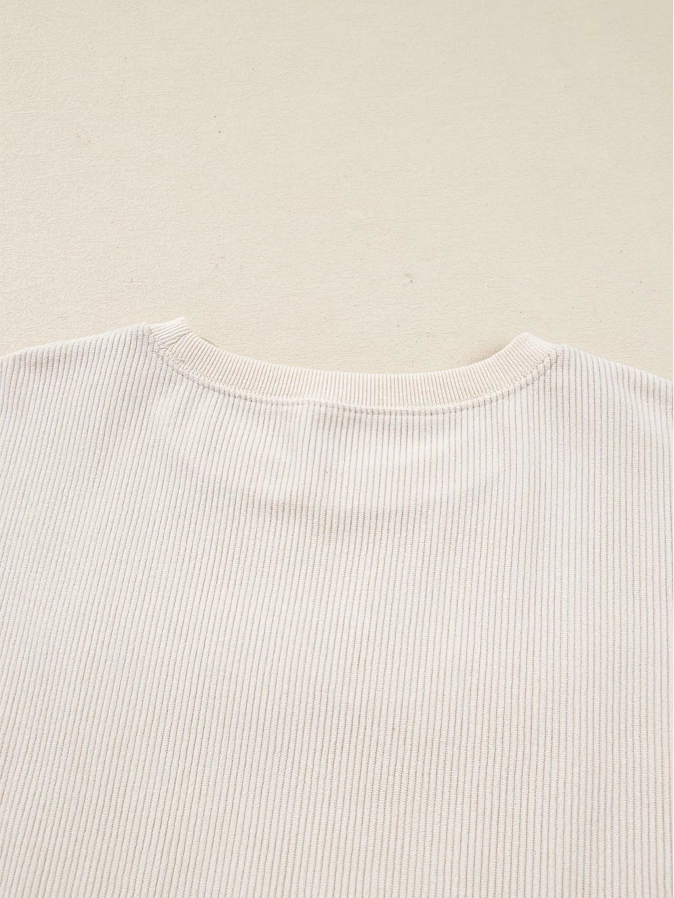 Merry Little Thing Corded Letter Graphic Ribbed Sweatshirt designed for comfort and style at Lookzlike