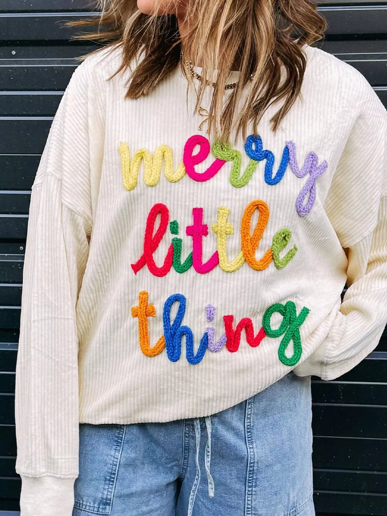 Merry Little Thing Corded Letter Graphic Ribbed Sweatshirt designed for comfort and style at Lookzlike