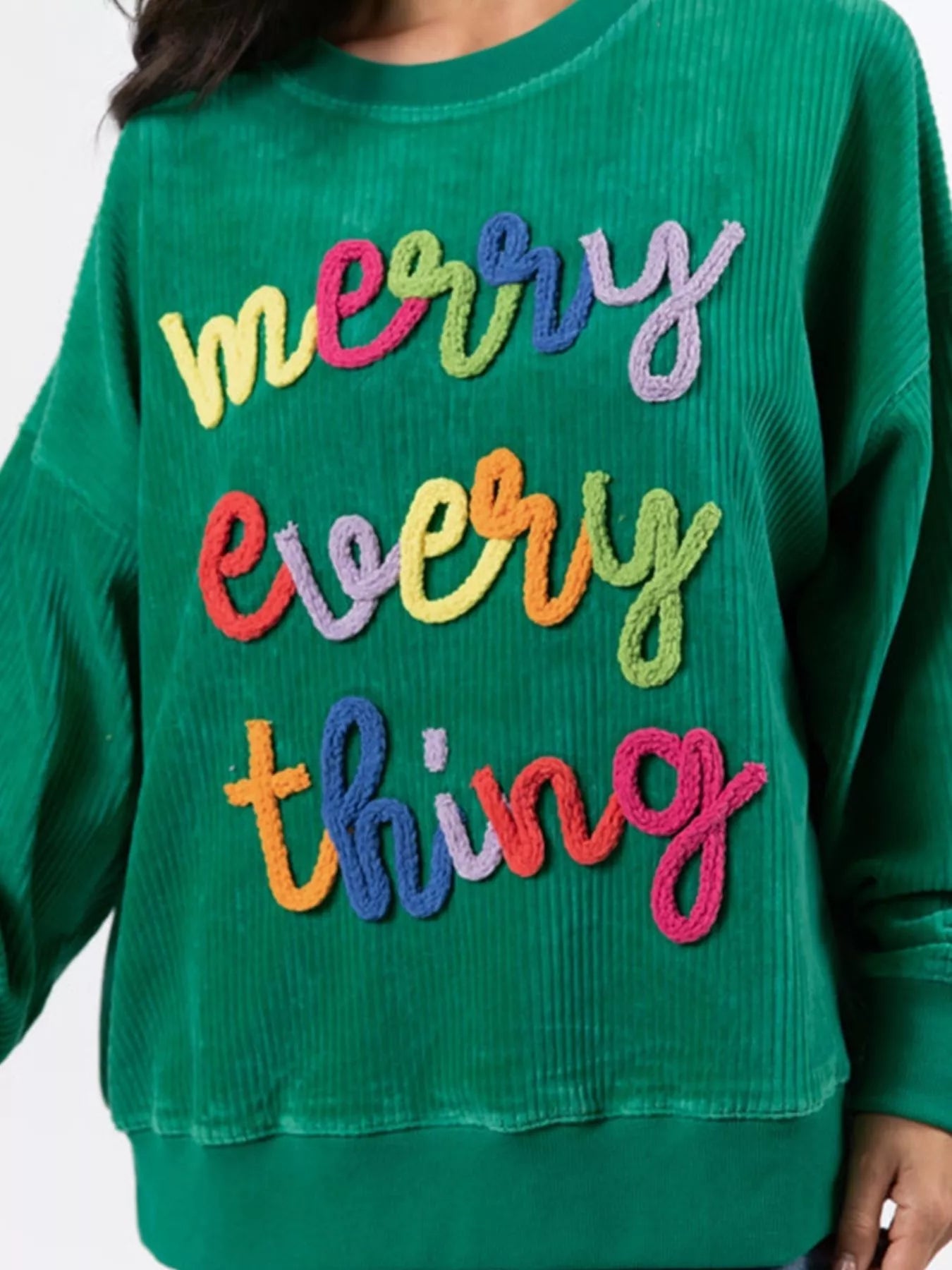 Merry Little Thing Corded Letter Graphic Ribbed Sweatshirt designed for comfort and style at Lookzlike