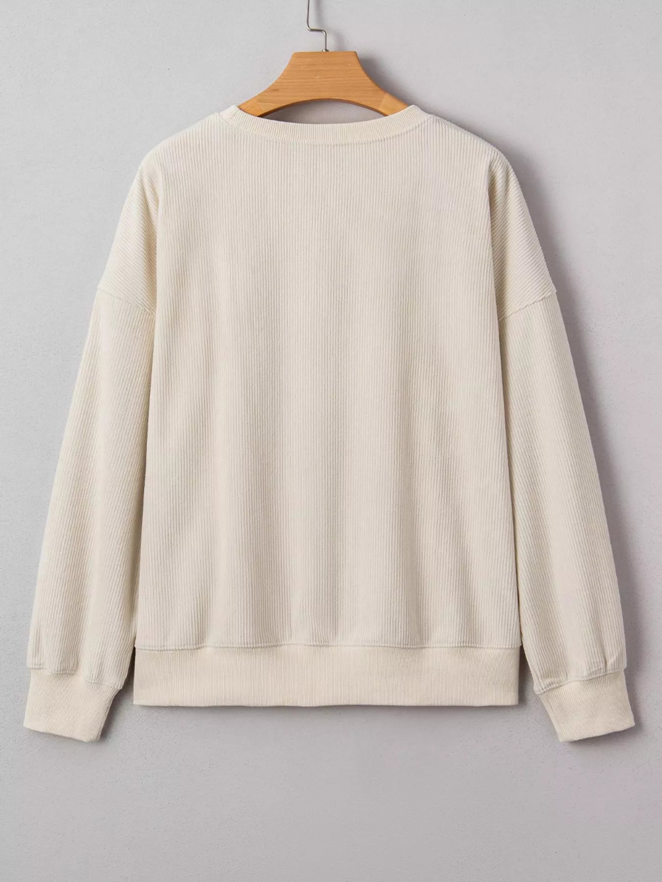 Merry Little Thing Corded Letter Graphic Ribbed Sweatshirt designed for comfort and style at Lookzlike