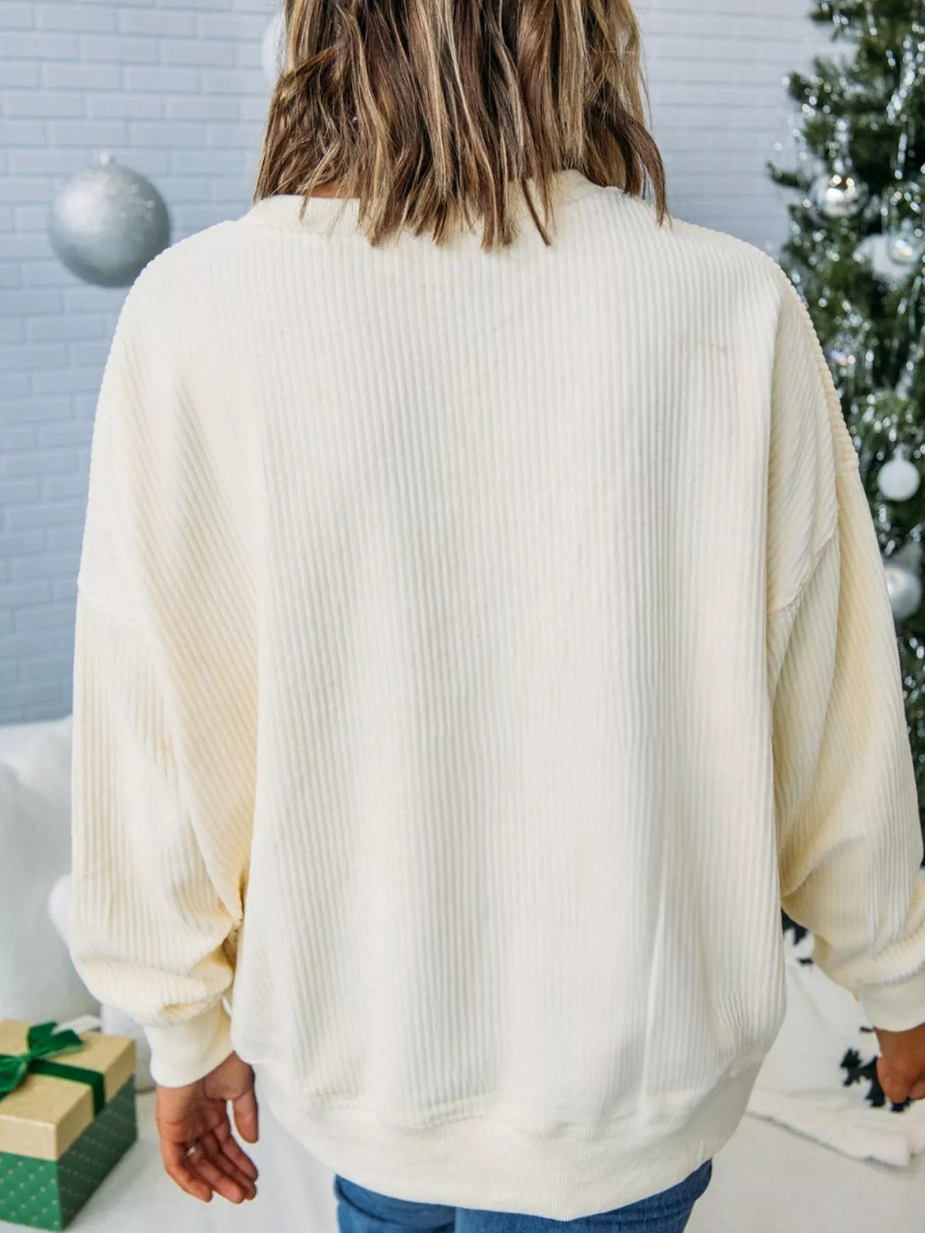 Merry Little Thing Corded Letter Graphic Ribbed Sweatshirt designed for comfort and style at Lookzlike