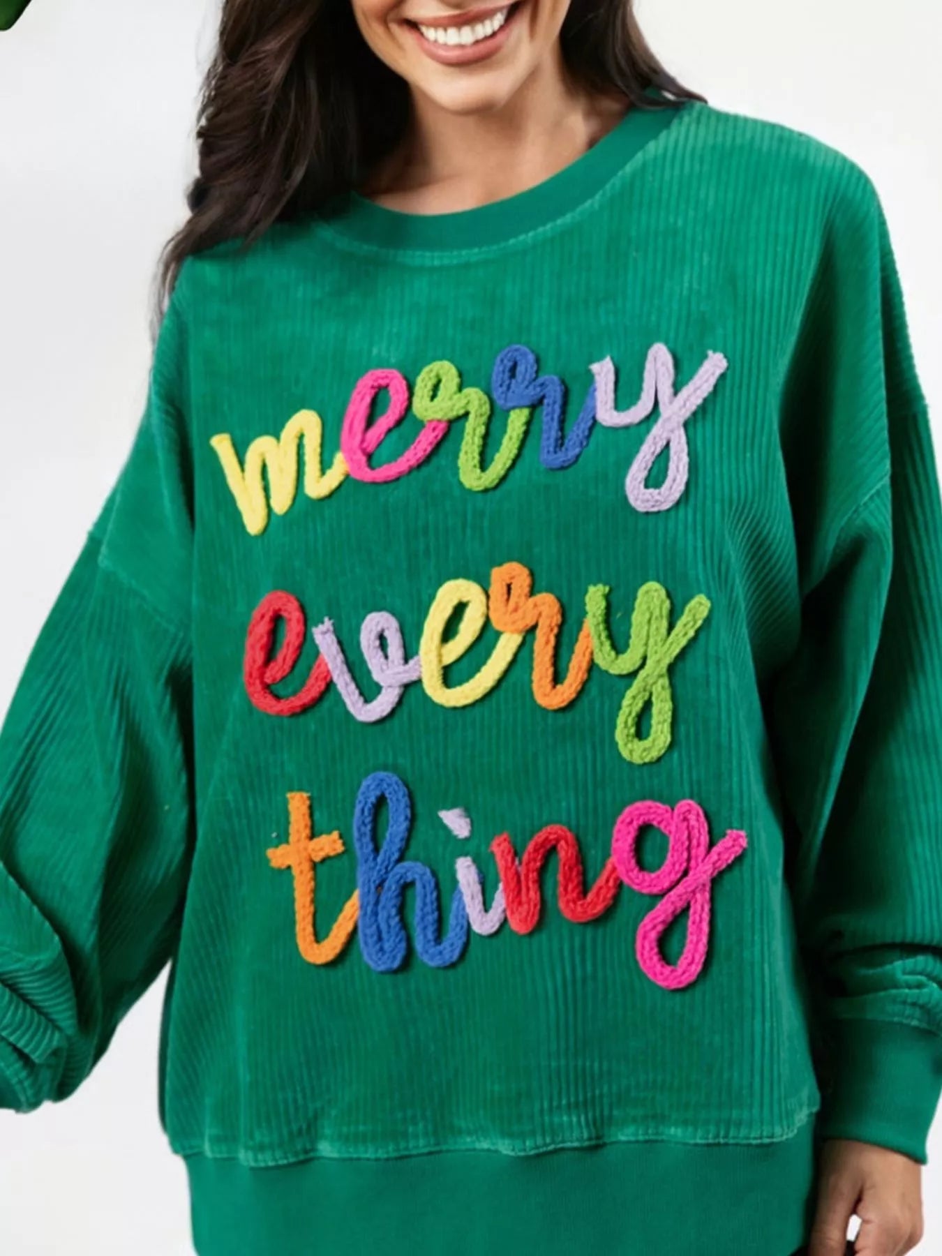 Merry Little Thing Corded Letter Graphic Ribbed Sweatshirt designed for comfort and style at Lookzlike