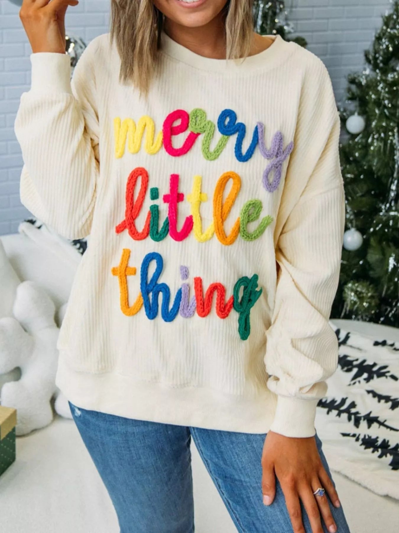 Merry Little Thing Corded Letter Graphic Ribbed Sweatshirt designed for comfort and style at Lookzlike