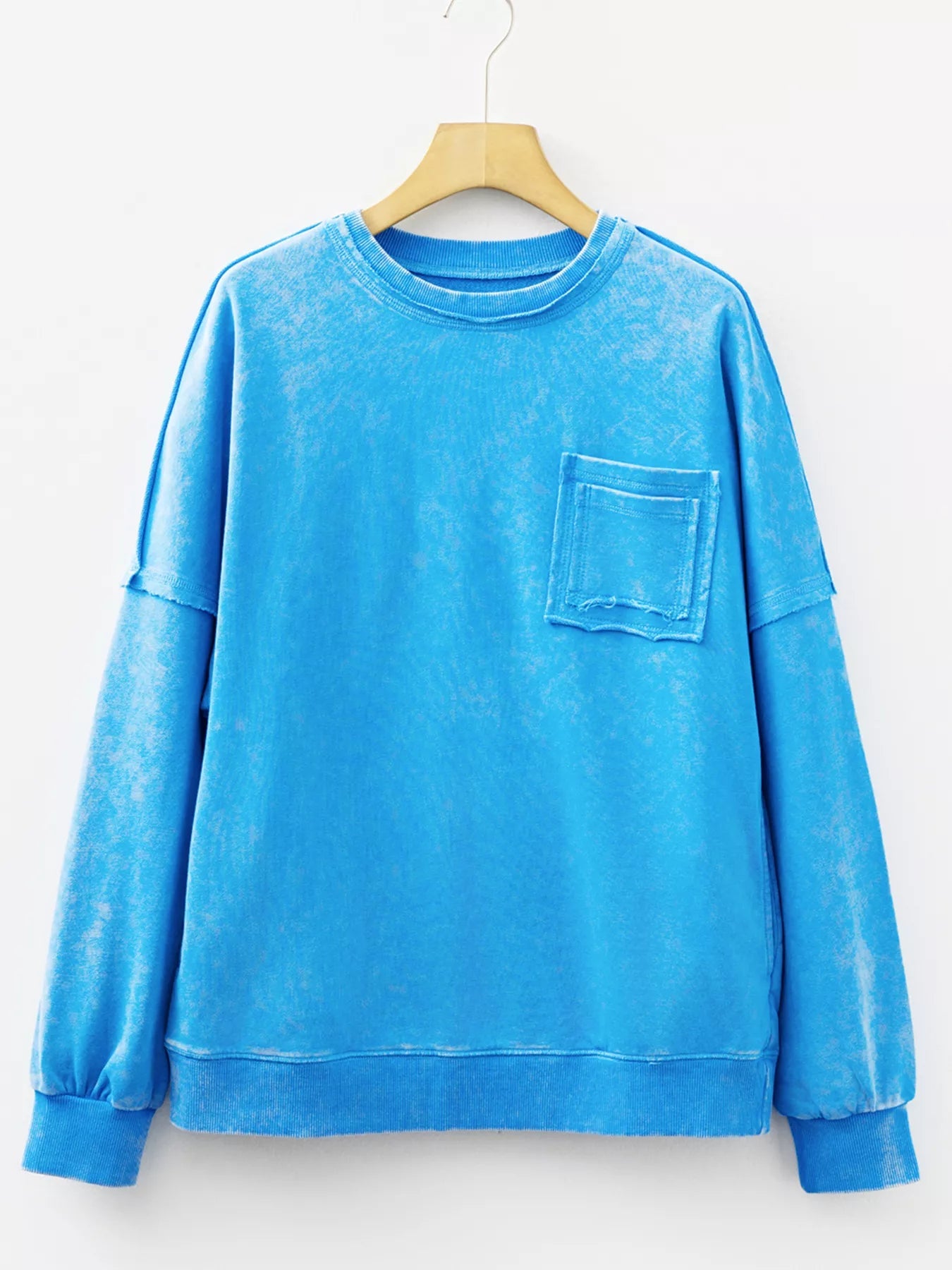 Mineral Wash Raw Seam Double Patched Pocket Sweatshirt designed for comfort and style at Lookzlike
