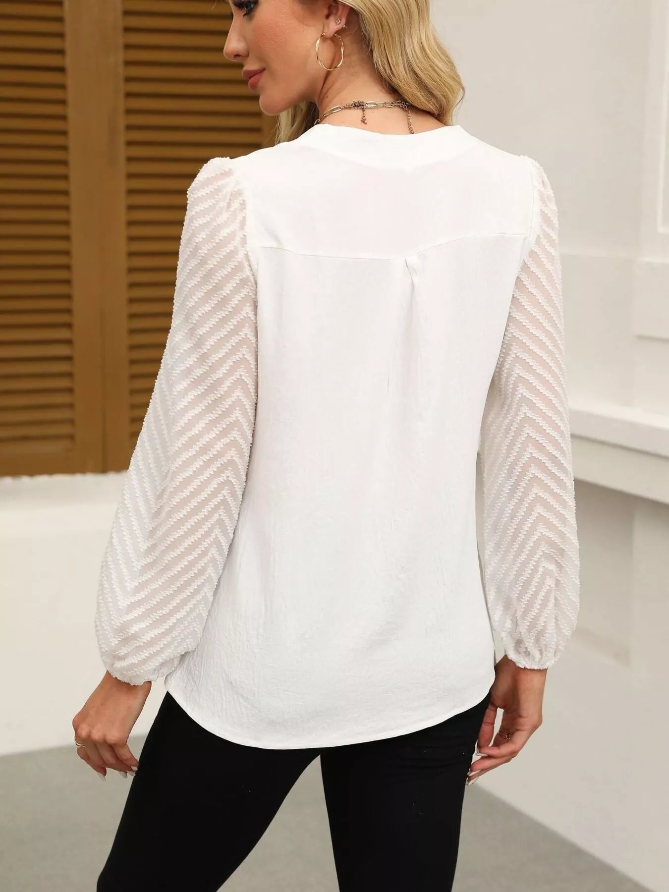 Notched Balloon Sleeve Blouse designed for comfort and style at Lookzlike