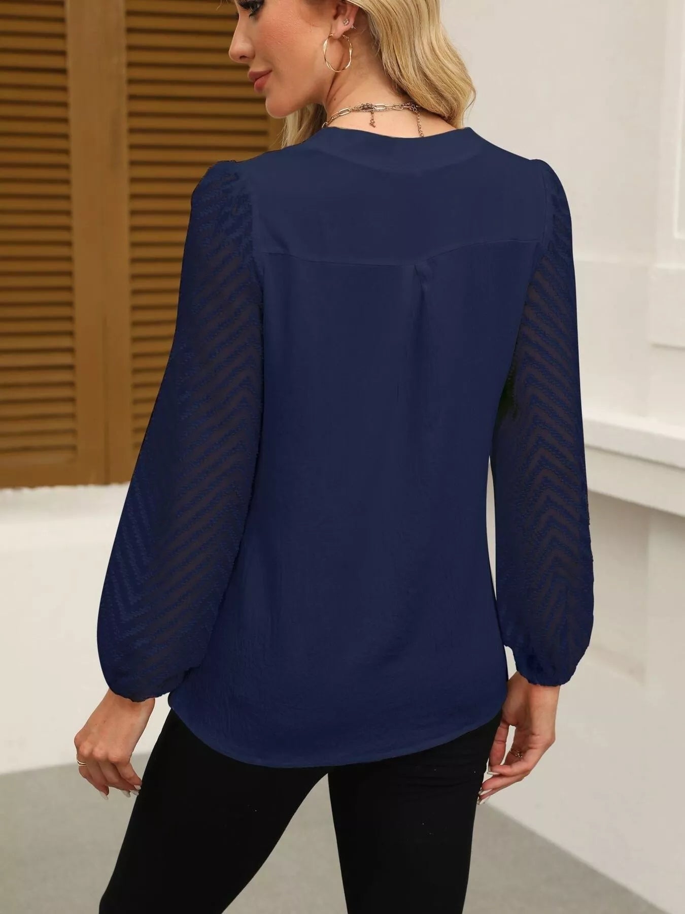 Notched Balloon Sleeve Blouse designed for comfort and style at Lookzlike