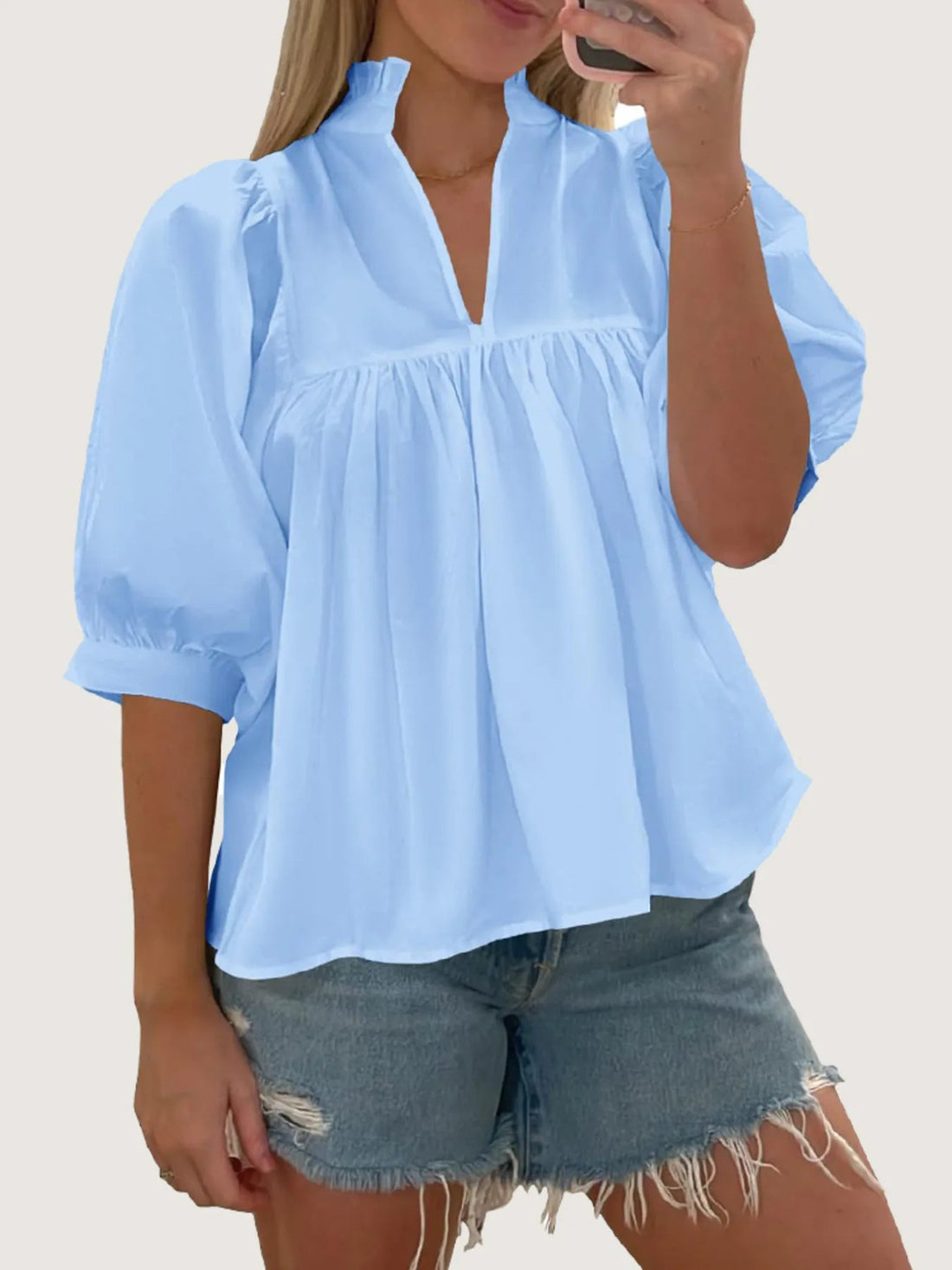 Notched Puff Sleeve Blouse designed for comfort and style at Lookzlike