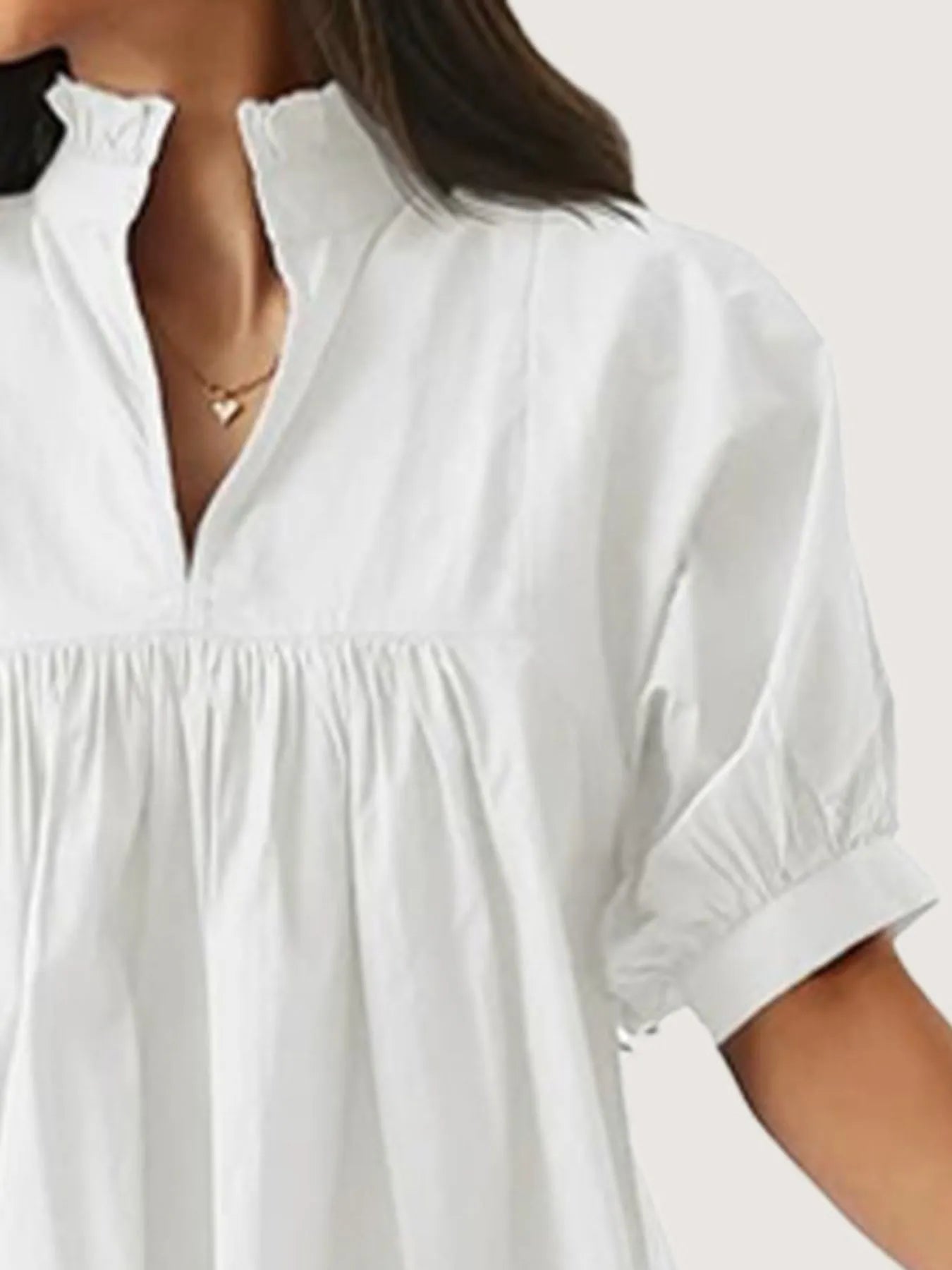 Notched Puff Sleeve Blouse designed for comfort and style at Lookzlike