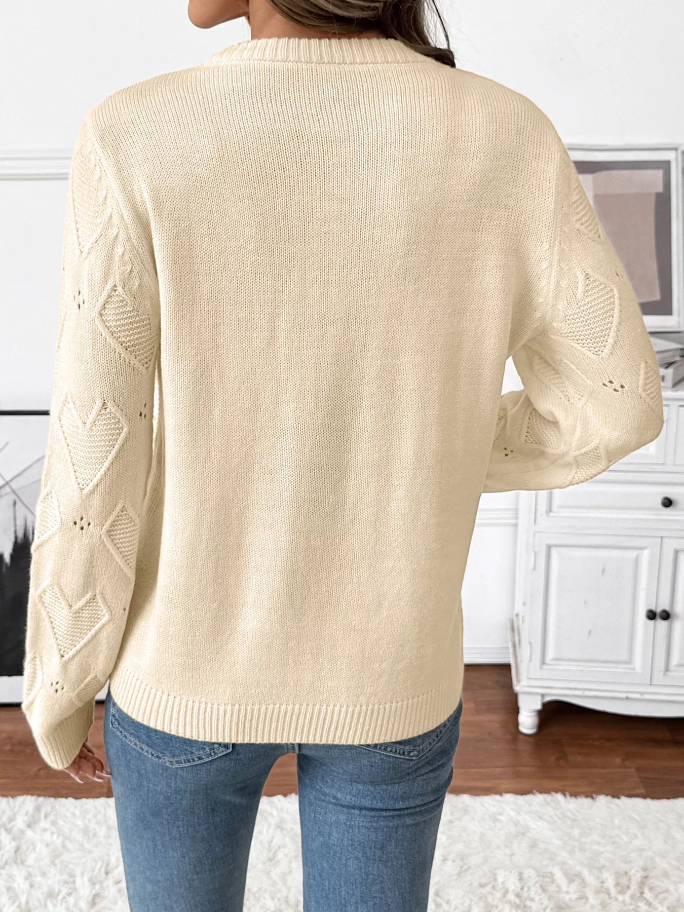 Openwork Heart Round Neck Sweater designed for comfort and style at Lookzlike
