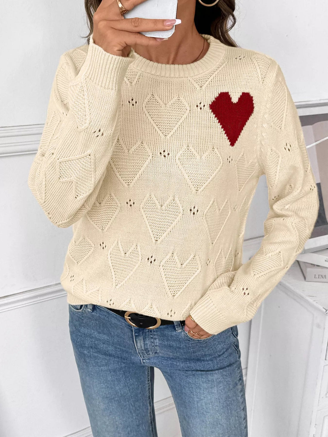 Openwork Heart Round Neck Sweater designed for comfort and style at Lookzlike
