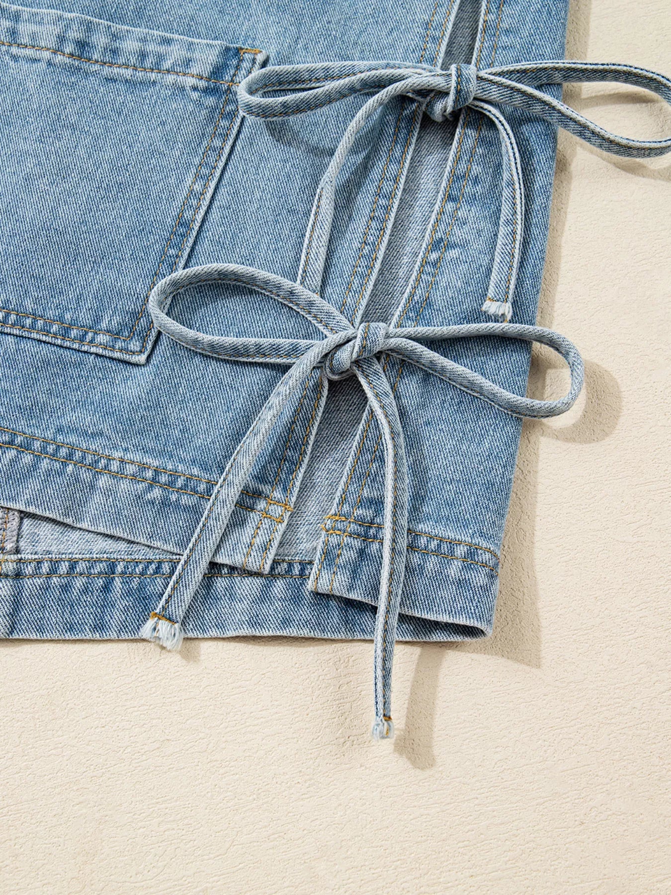 Patched Pockets Side Tie Denim Jacket designed for comfort and style at Lookzlike