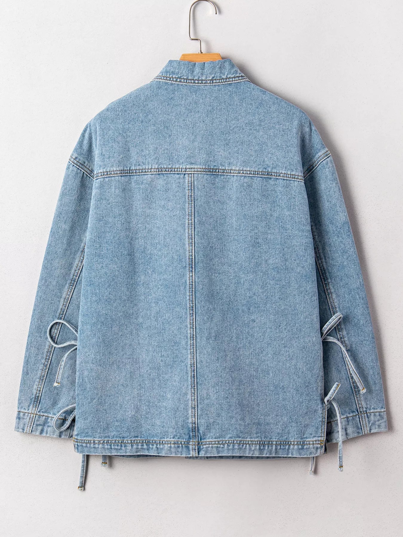 Patched Pockets Side Tie Denim Jacket designed for comfort and style at Lookzlike