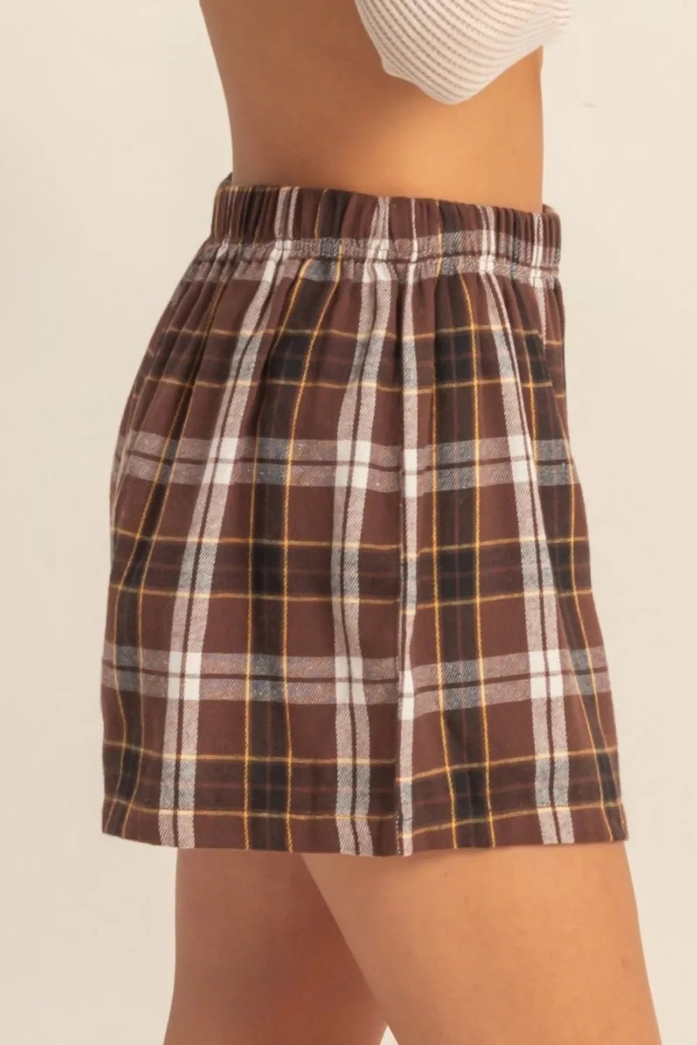 Plaid Button Front Elastic Waist Shorts designed for comfort and style at Lookzlike