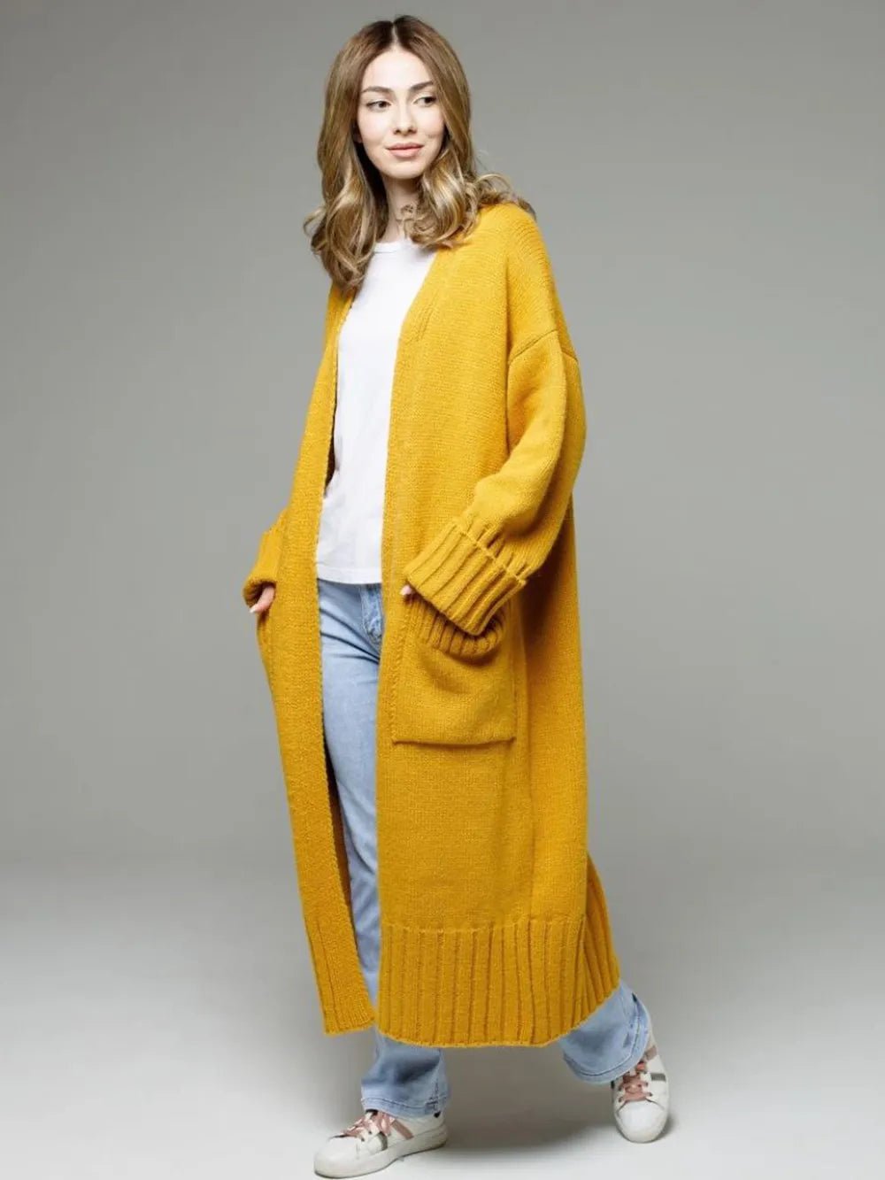 Pocketed Open Front Dropped Shoulder Cardigan designed for comfort and style at Lookzlike