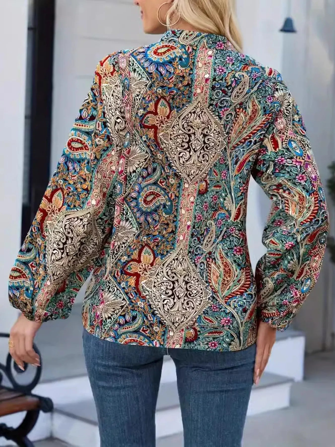 Printed Notched Balloon Sleeve Blouse designed for comfort and style at Lookzlike
