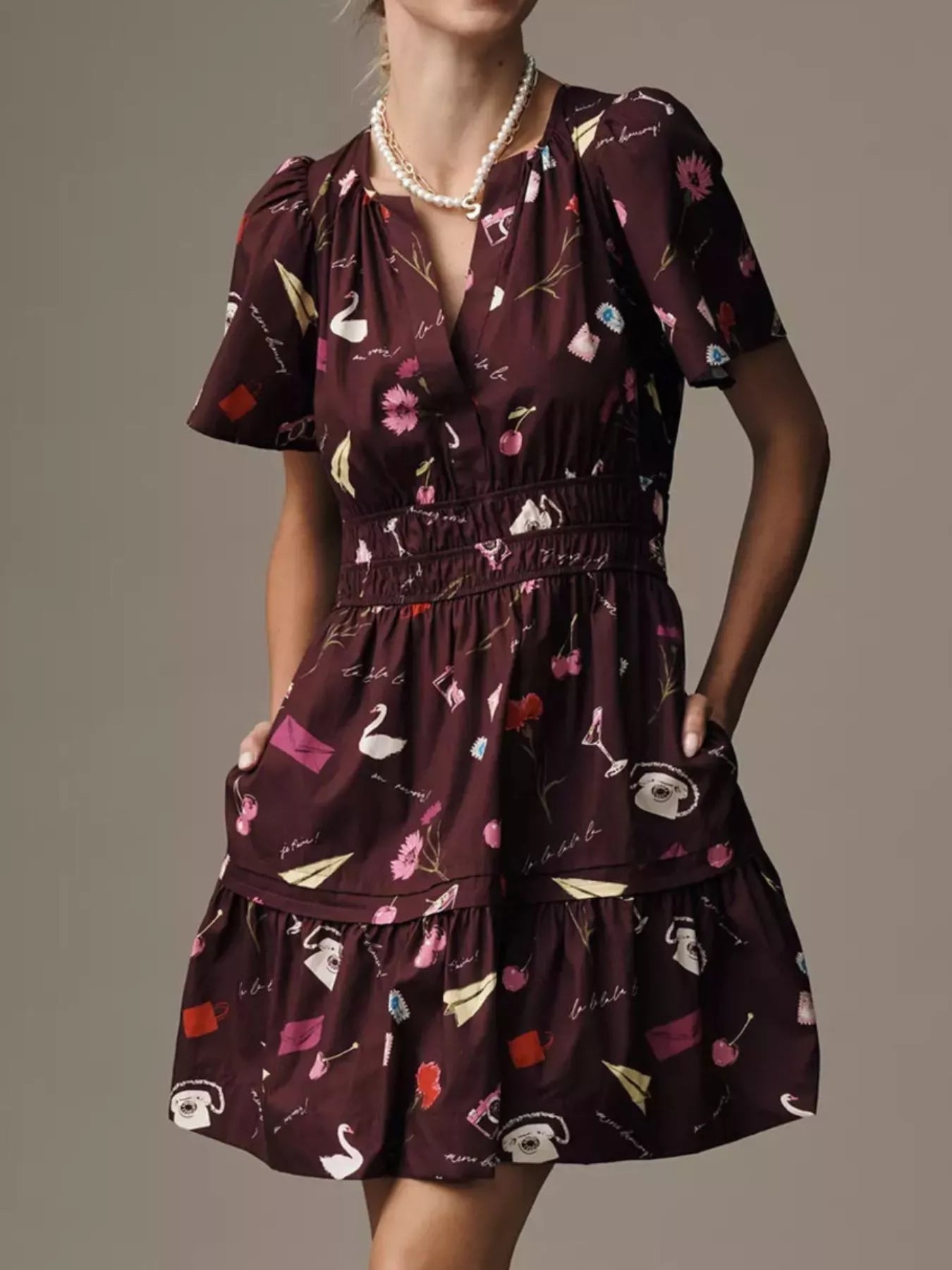 Printed Notched Short Sleeve Dress designed for comfort and style at Lookzlike