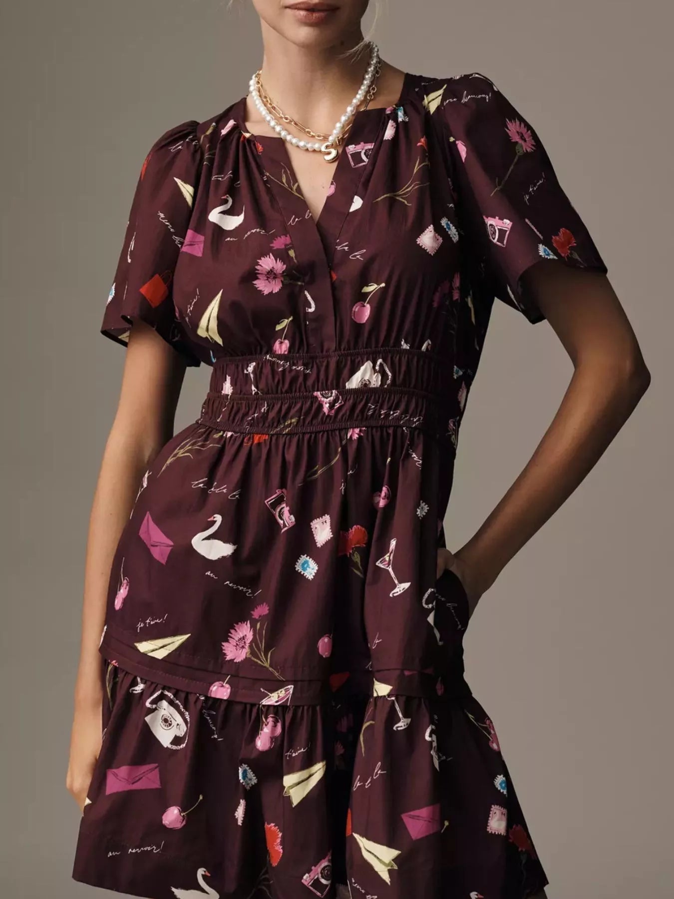 Printed Notched Short Sleeve Dress designed for comfort and style at Lookzlike