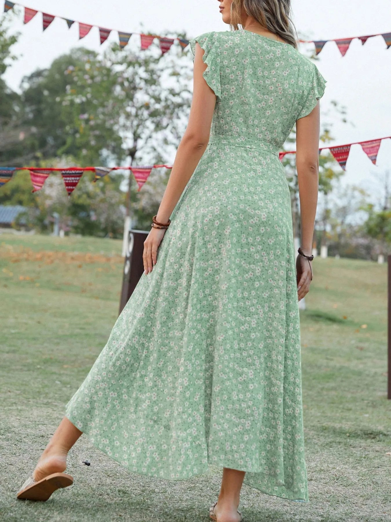 Printed Surplice Ruffle Sleeve Dress designed for comfort and style at Lookzlike