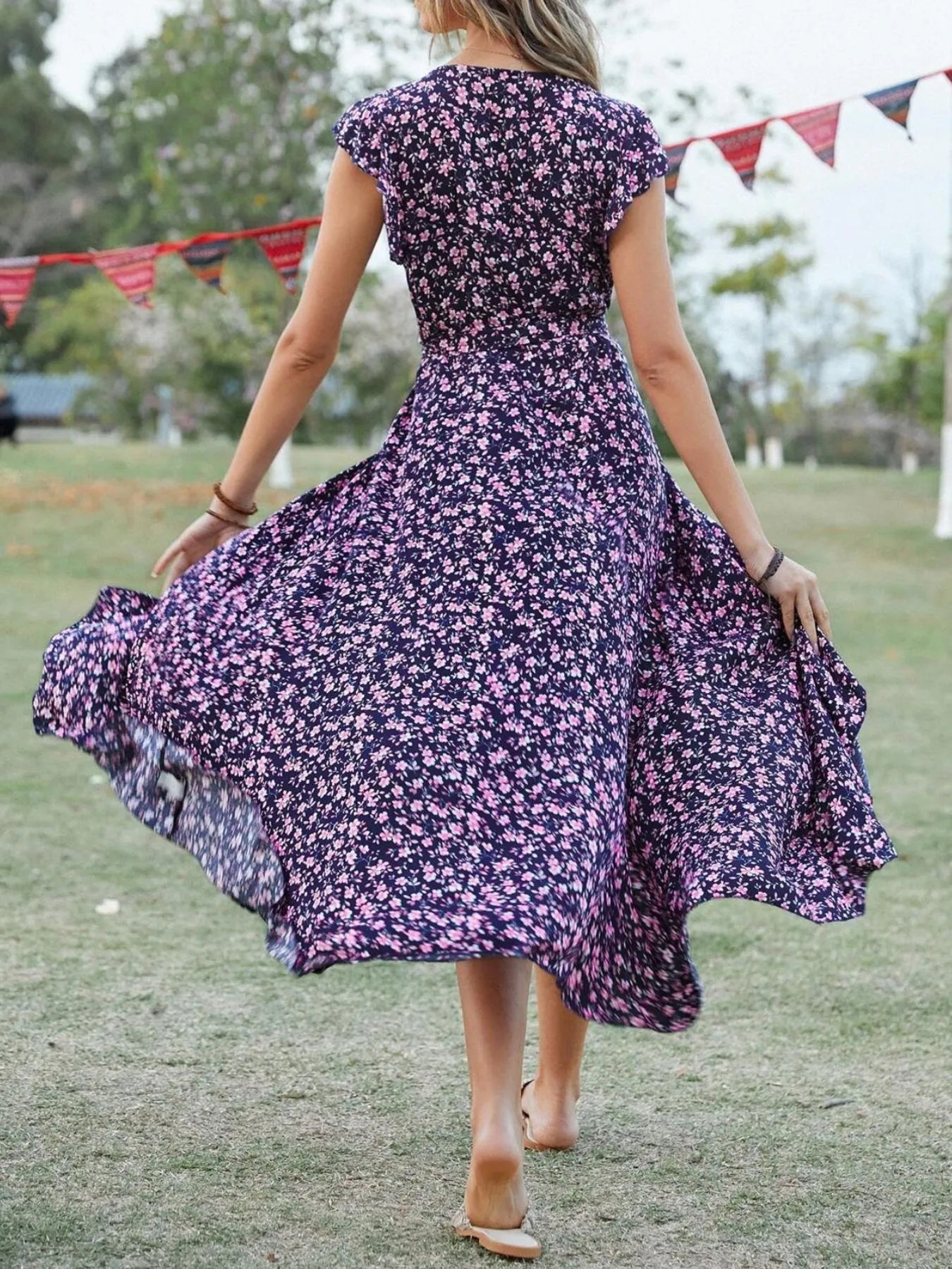 Printed Surplice Ruffle Sleeve Dress designed for comfort and style at Lookzlike