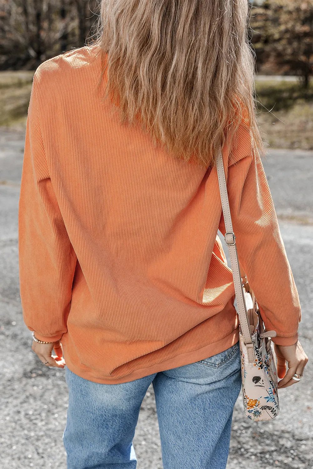 Pumpkin Round Neck Long Sleeve Sweatshirt designed for comfort and style at Lookzlike