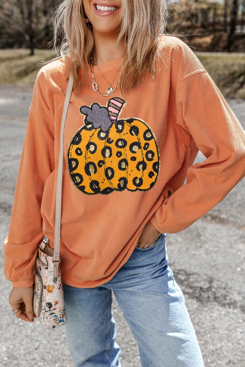 Pumpkin Round Neck Long Sleeve Sweatshirt designed for comfort and style at Lookzlike