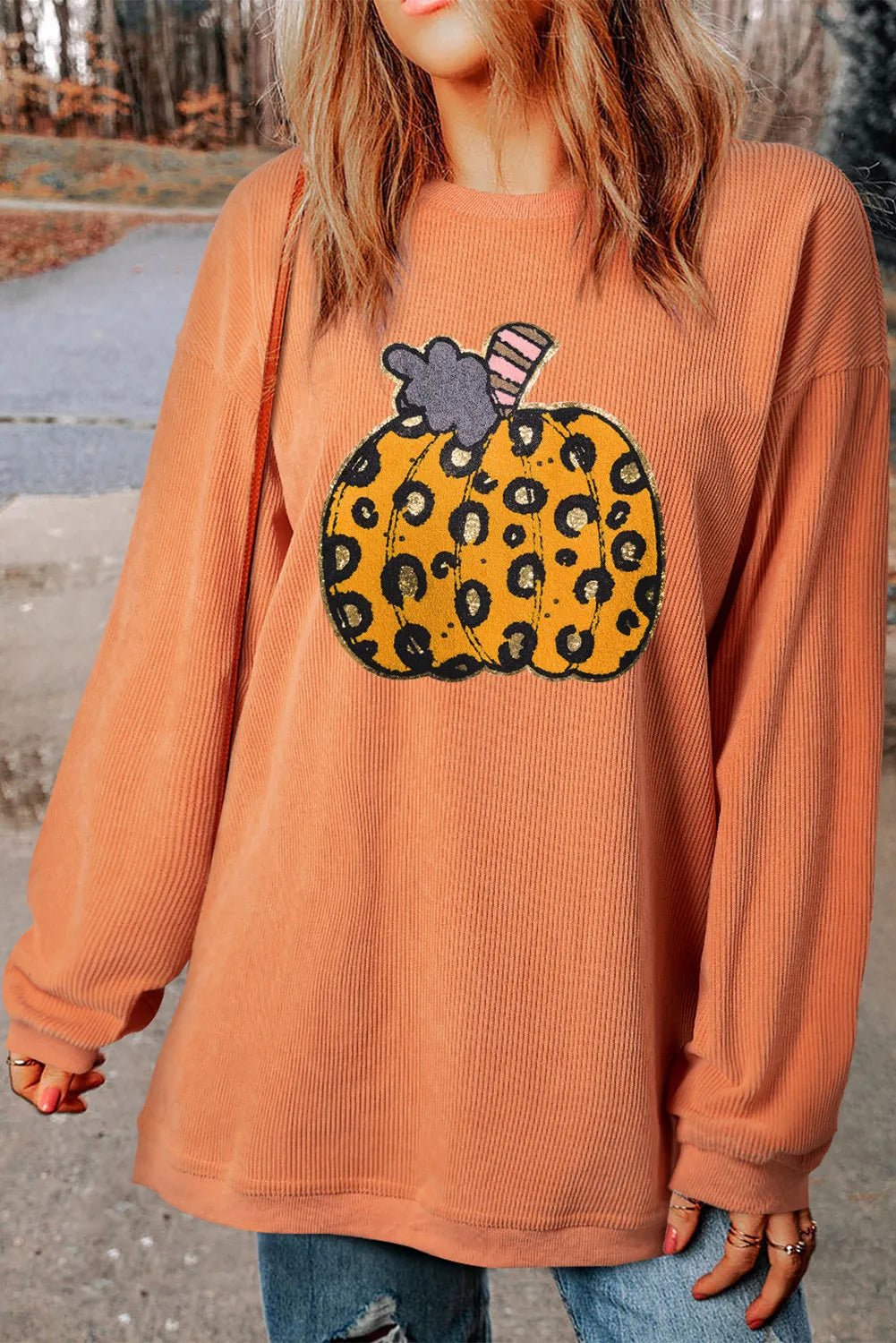 Pumpkin Round Neck Long Sleeve Sweatshirt designed for comfort and style at Lookzlike