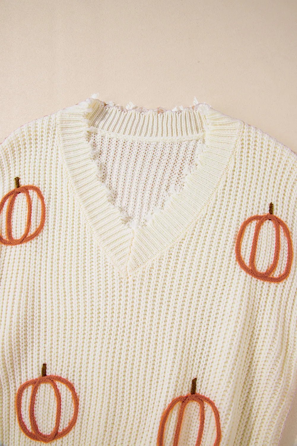 Raw Hem Pumpkin V - Neck Long Sleeve Sweater designed for comfort and style at Lookzlike