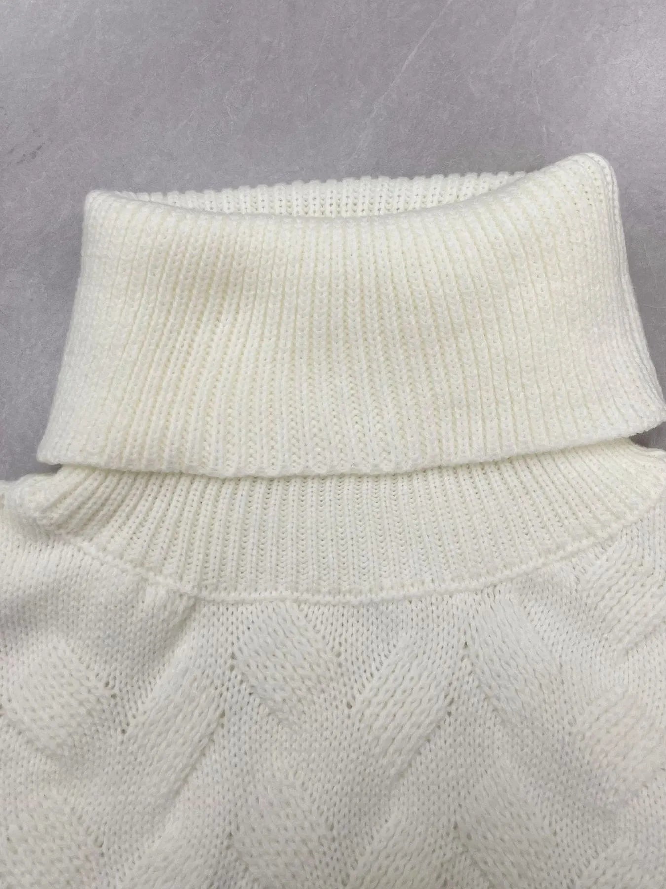 Ribbed Hem Turtleneck Long Sleeve Sweater designed for comfort and style at Lookzlike