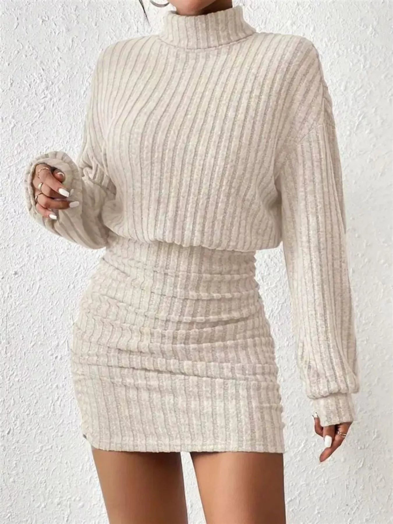 Ribbed Knit Turtleneck Bodycon Mini Dress designed for comfort and style at Lookzlike