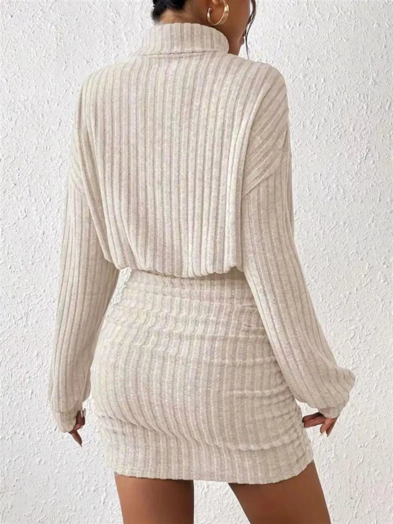 Ribbed Knit Turtleneck Bodycon Mini Dress designed for comfort and style at Lookzlike