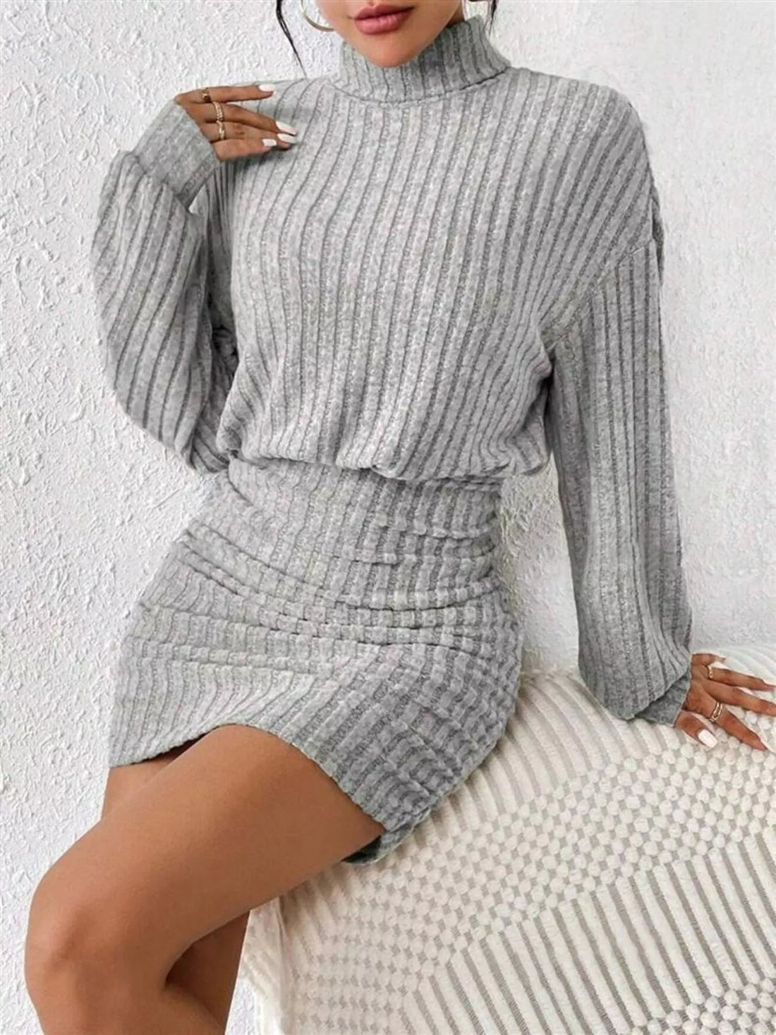 Ribbed Knit Turtleneck Bodycon Mini Dress designed for comfort and style at Lookzlike