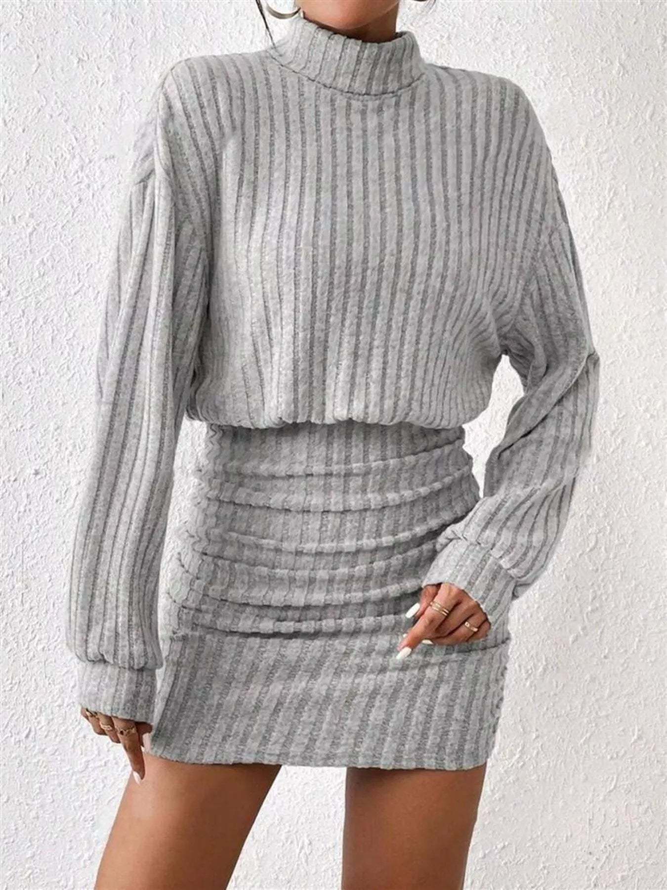 Ribbed Knit Turtleneck Bodycon Mini Dress designed for comfort and style at Lookzlike